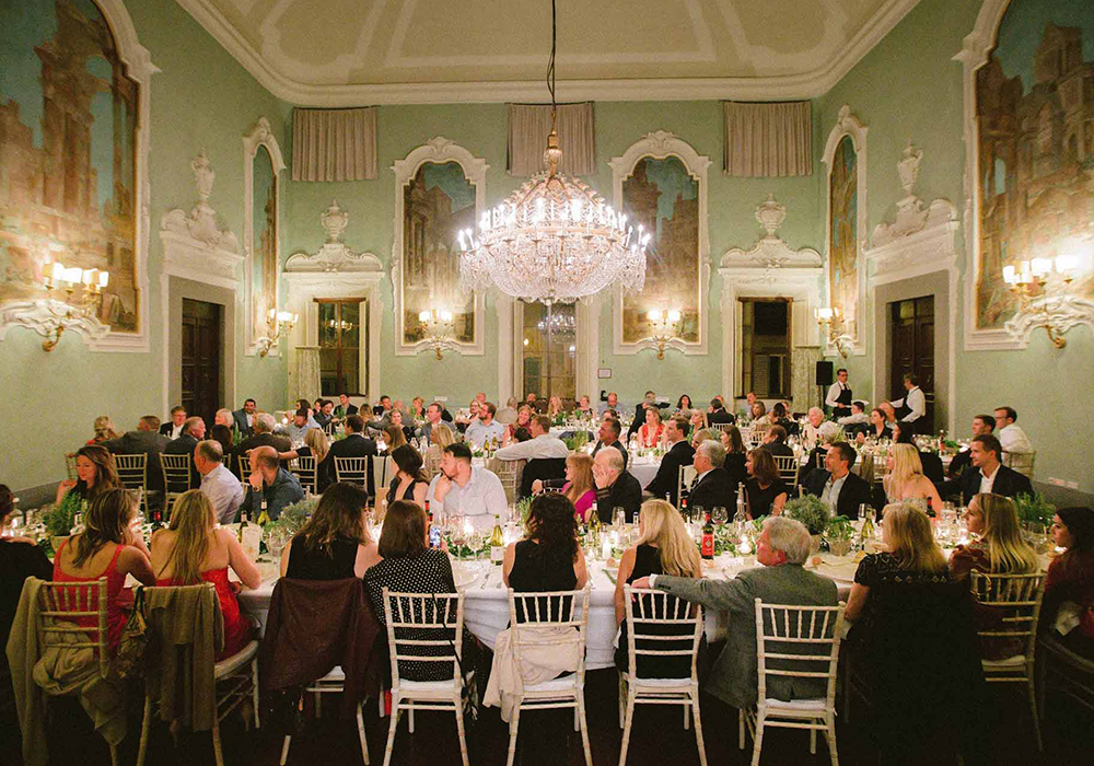 Gala dinner with imperial tables in the ballroom of Palazzo Ximenes Panciatichi