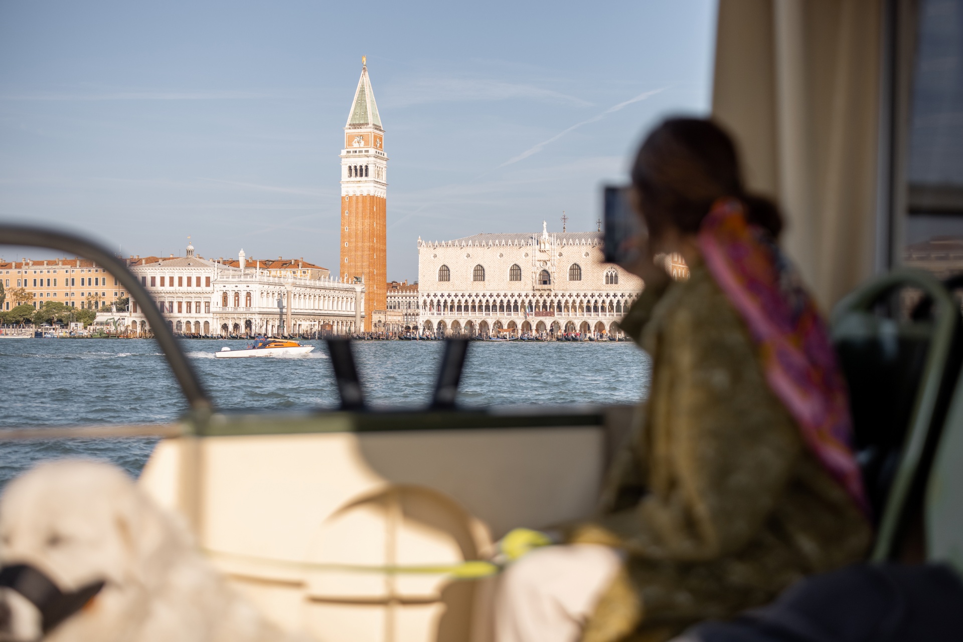 Private wooden boat tour through the canals of Venice